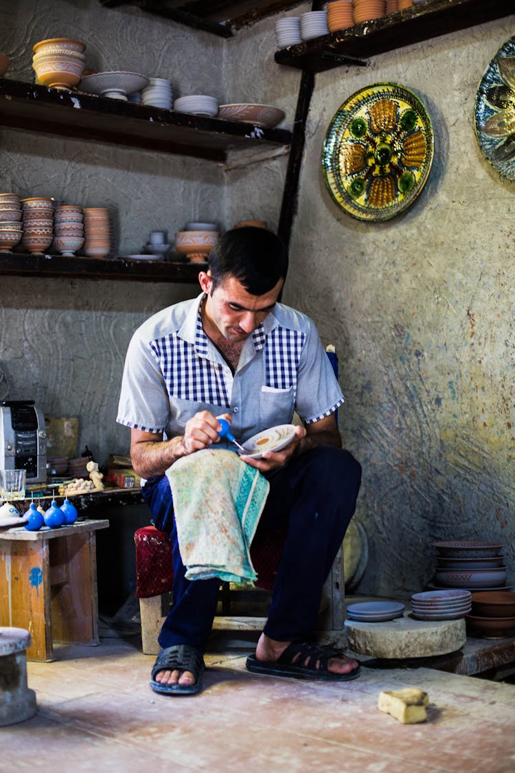 Artisan Decorating Clay Plates