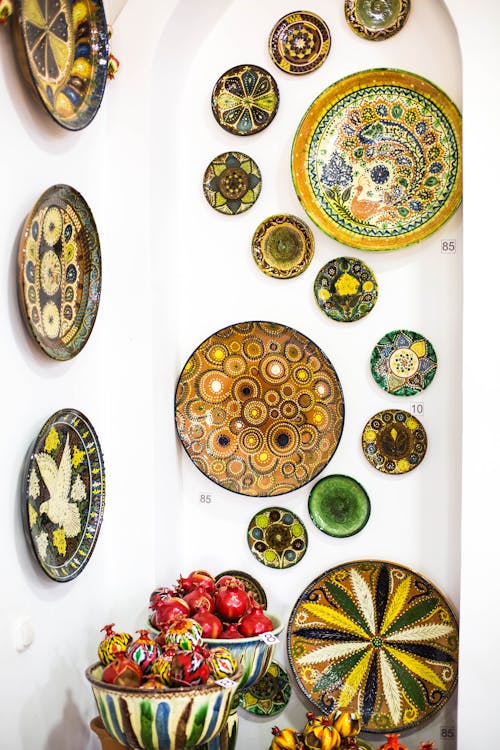 Assorted Ceramic Plate Decorations on White Wall
