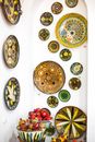 Assorted Color Ceramic Plates on White Table