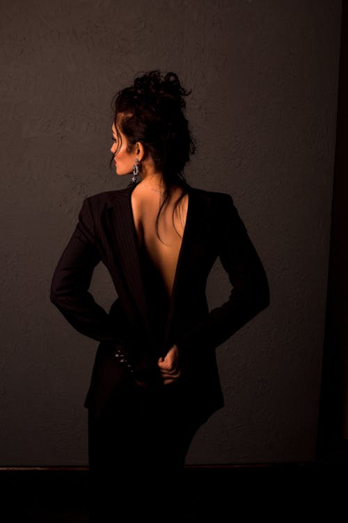 A Sexy Woman Wearing Black Backless Dress 