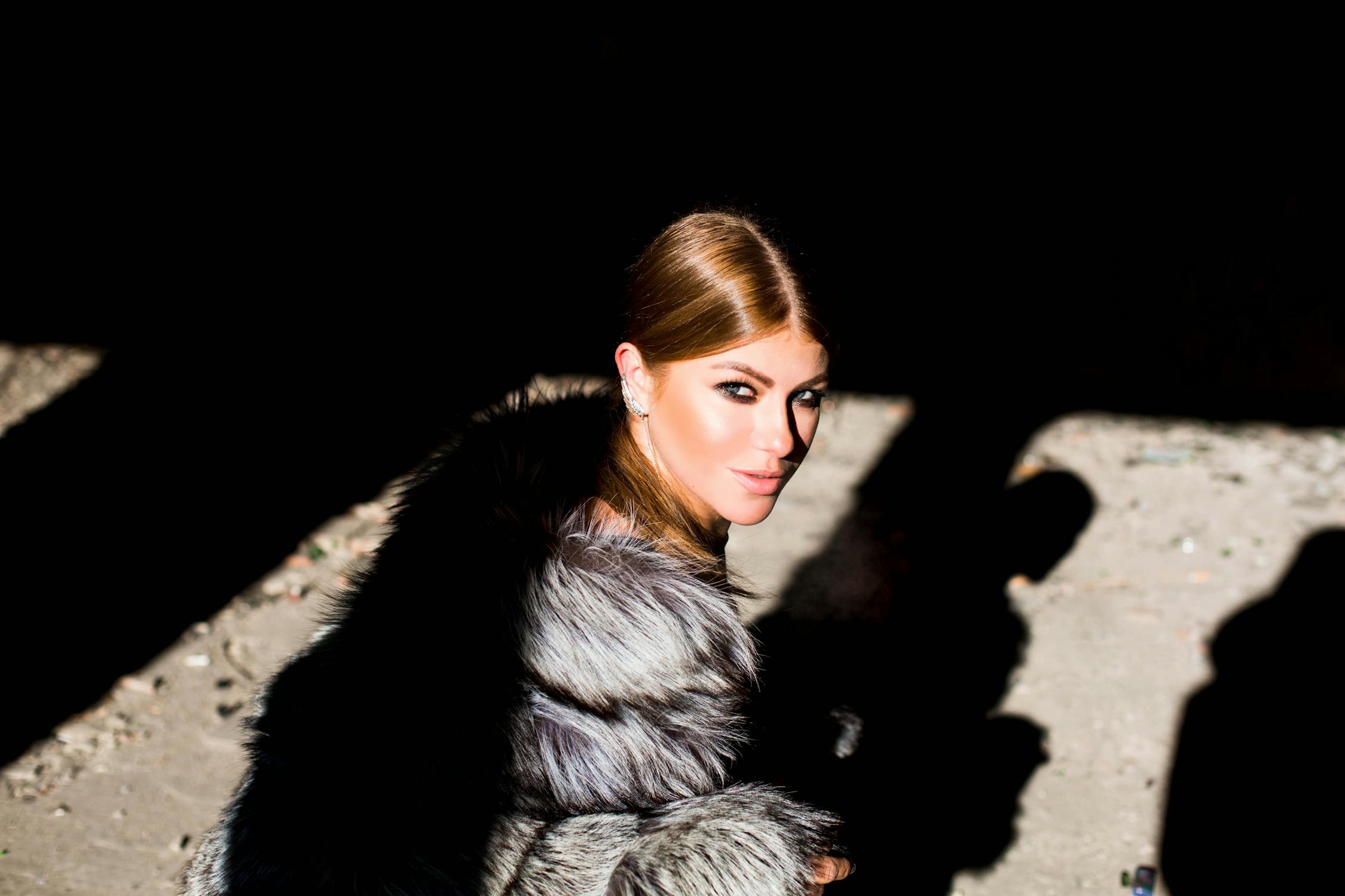 Woman in Black and Gray Fur Coat