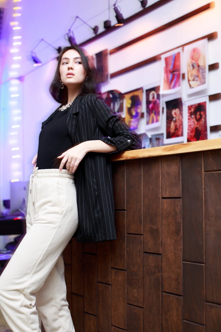 Beautiful Woman Leaning On A Counter