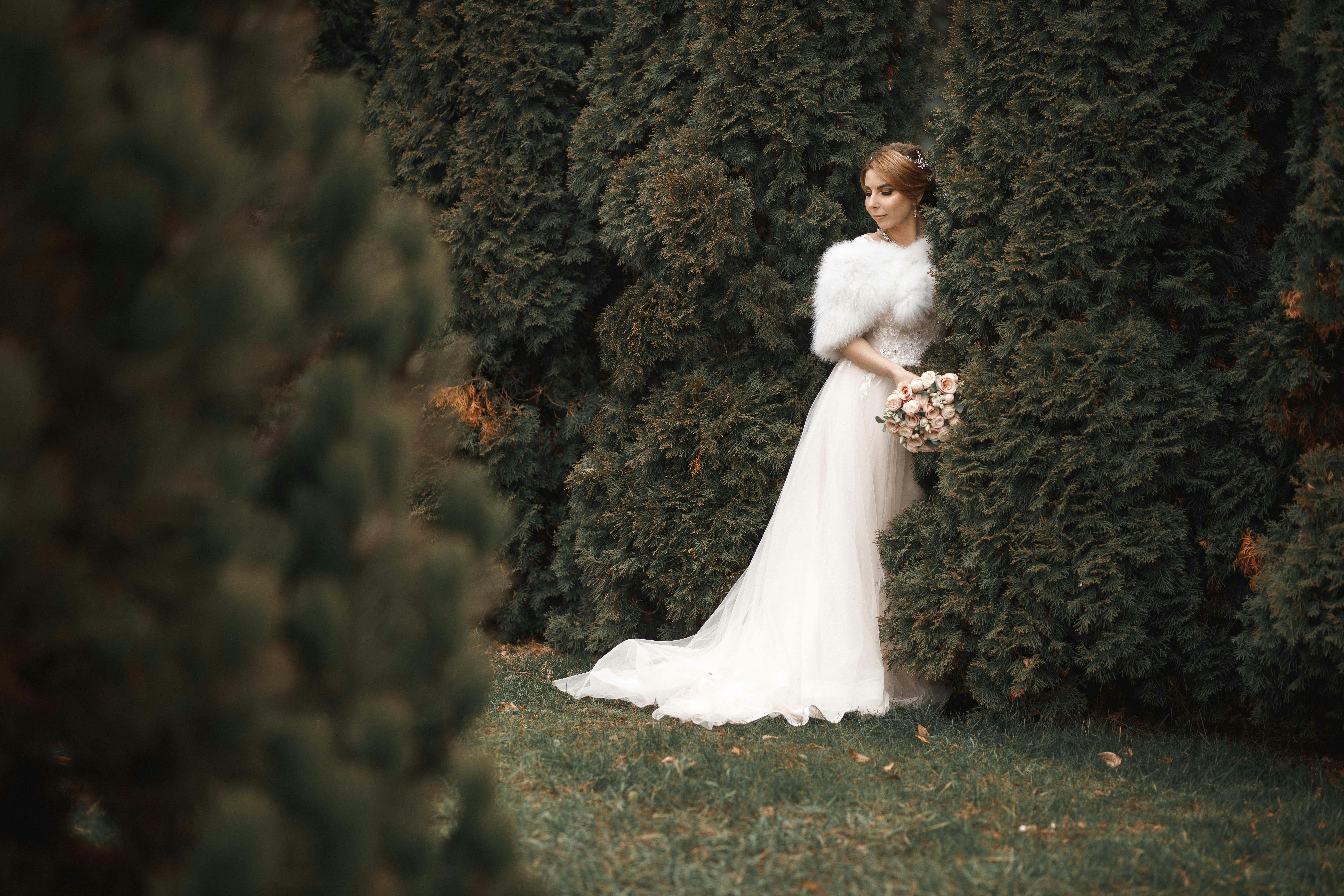 Bride in Wedding Dress in Garden · Free Stock Photo