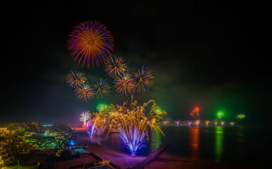 Spectacular fireworks illuminate the night sky over Ras Al-Khaimah's coastline.