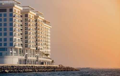 White Concrete Building Near the Ocean 