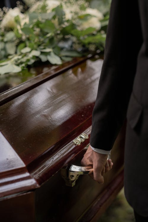 Free A Person Carrying a Casket  Stock Photo