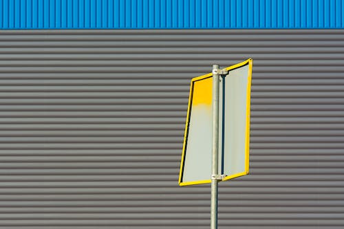 Yellow and Gray Street Sign