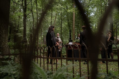 Free People Mourning in Cemetery Stock Photo