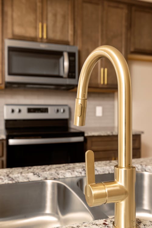 Free Marble Countertop with Brass Faucet  Stock Photo