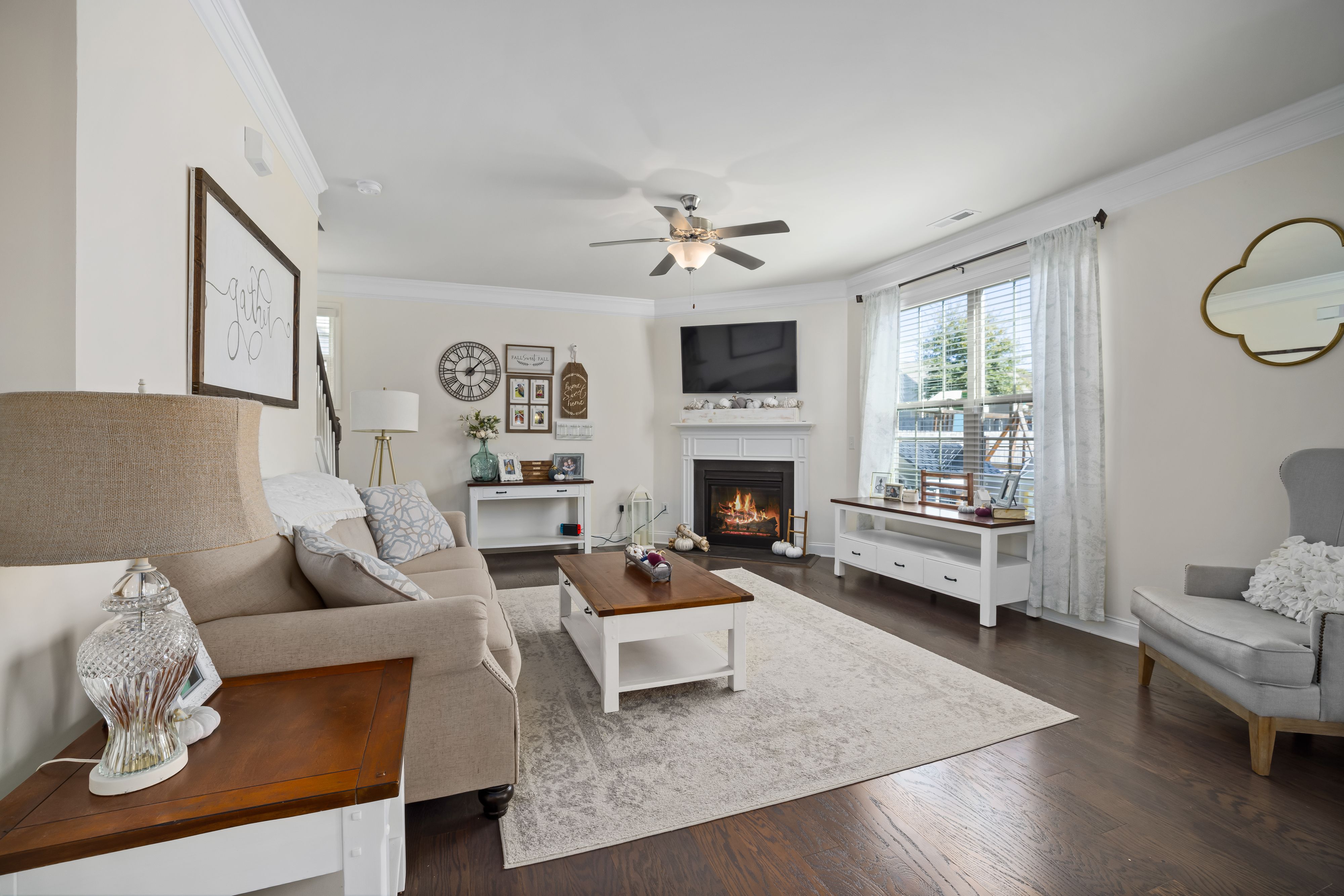 Living Room With Beige Sofa and Wooden Table · Free Stock Photo