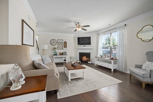 Living Room With Beige Sofa and Wooden Table