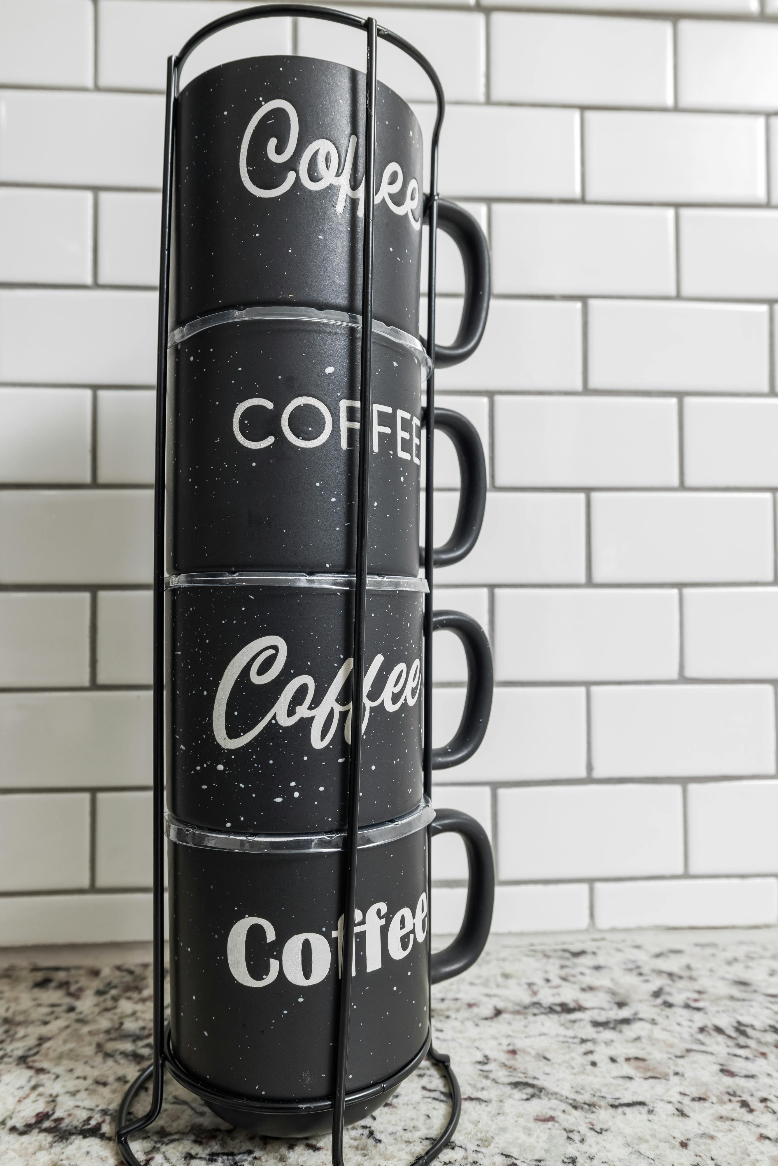 A Black Metal Mug Holder · Free Stock Photo