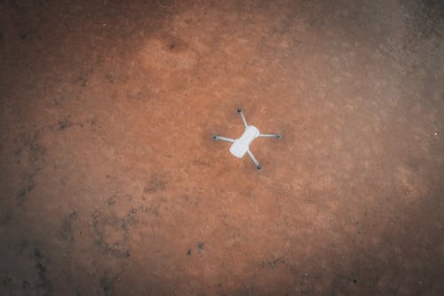 Top View of a Drone Flying over Wet Sand