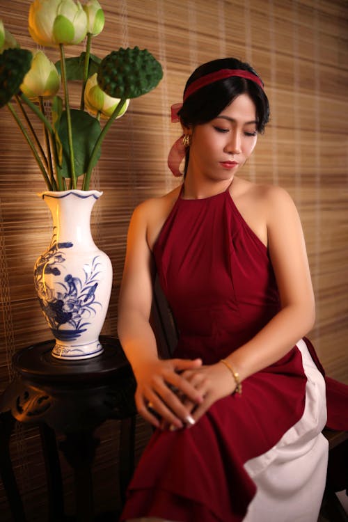 A Woman Wearing Red Dress 