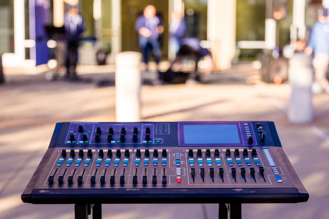 Mixing Console in Blurred Background 