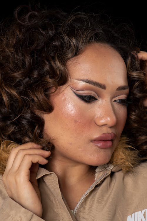 Woman with Curly Hair Posing