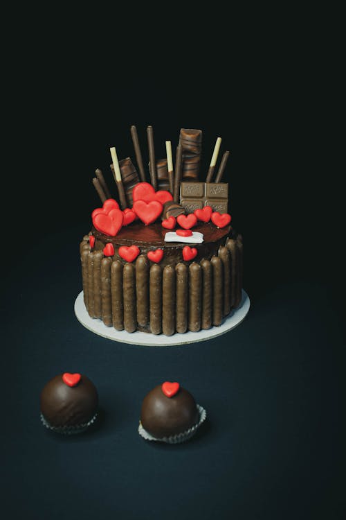 Free Chocolate Cake With Red Hearts on Top  Stock Photo