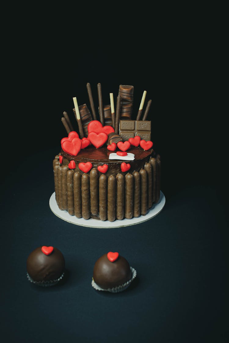 Chocolate Cake With Red Hearts On Top 