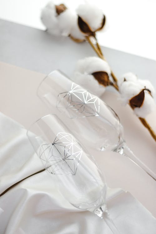 Clear Champagne Glasses on the Table