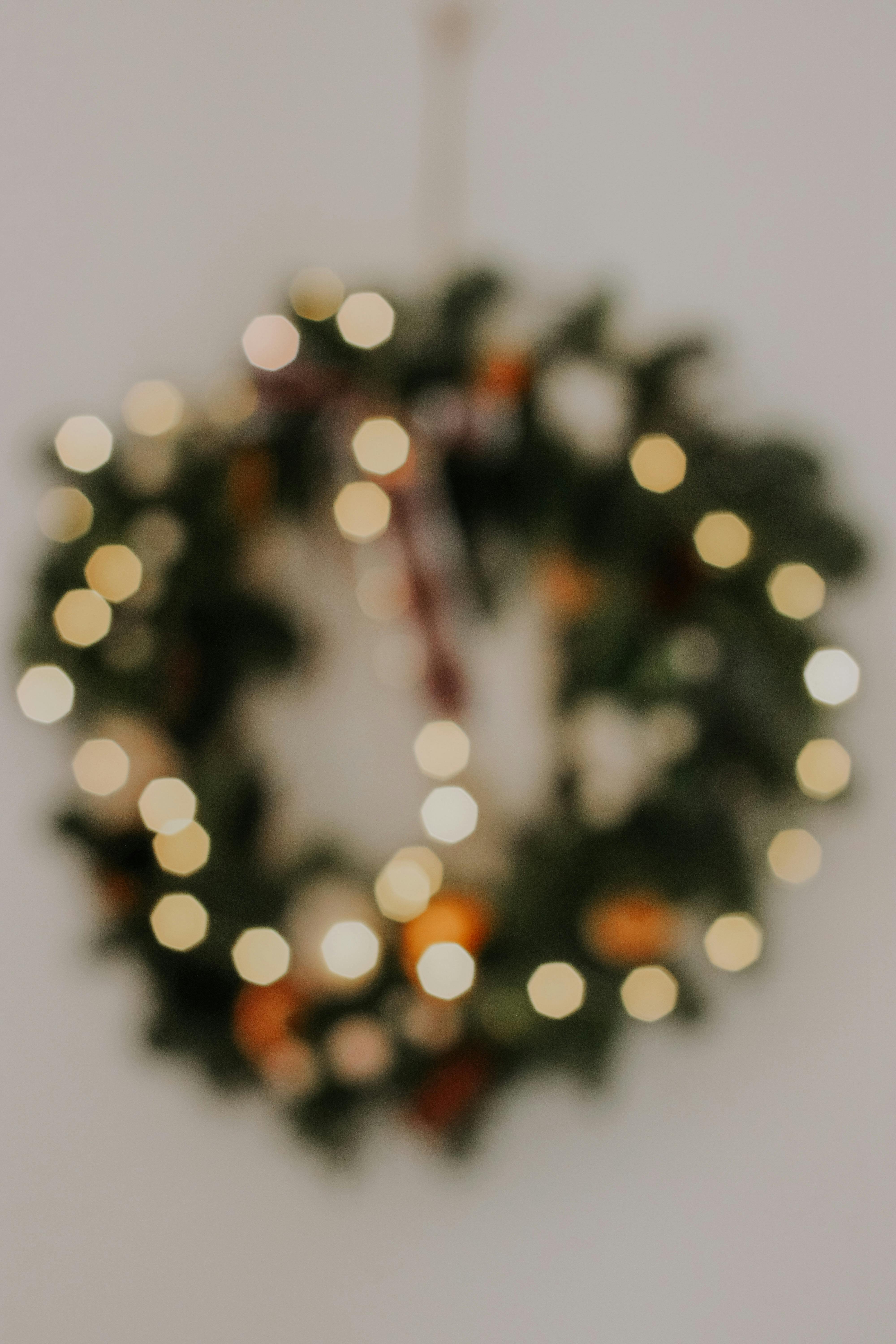 an illuminated christmas wreath