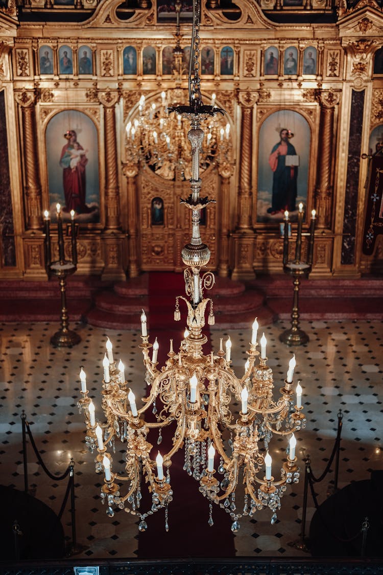 Chandelier And Paintings In Church