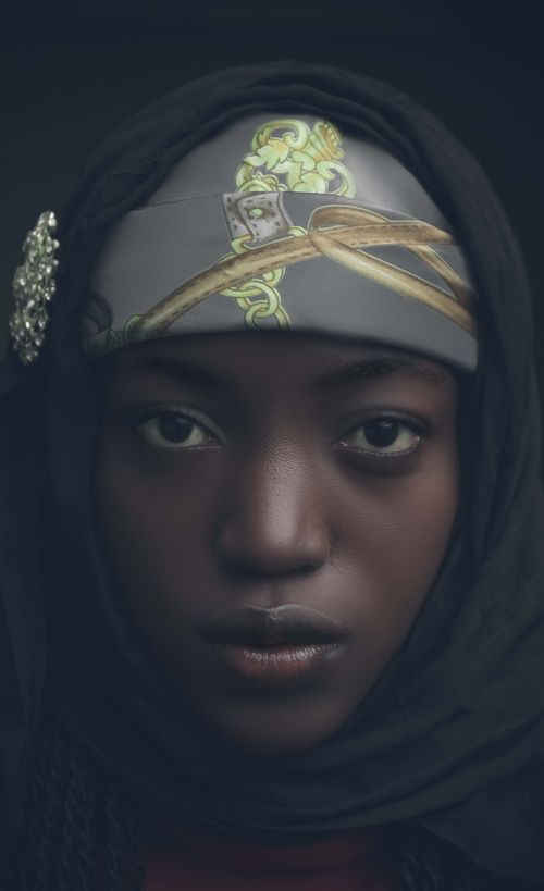 Free Close-up portrait of a woman in a hijab, showcasing beauty and elegance. Stock Photo