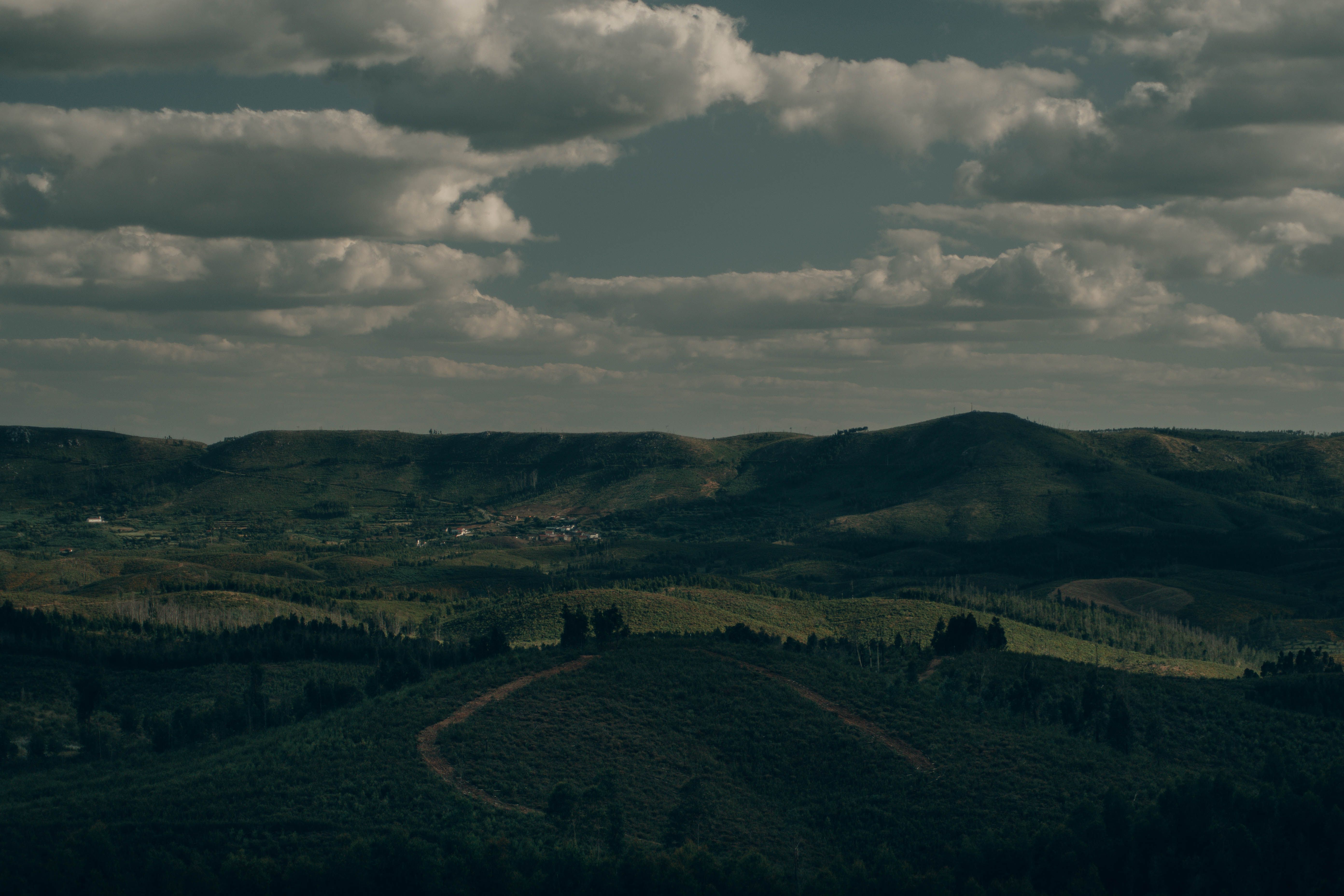 Breathtaking view of hills and clouds in Proença-a-Nova, Portugal.