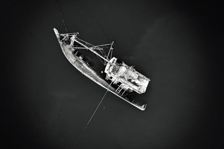 Fishing Boat Sinking On Sea