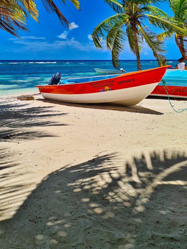 Motor Boats Docked On The Beach