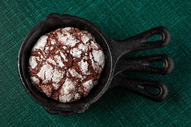 Brown And White Cookie On Black Skillet