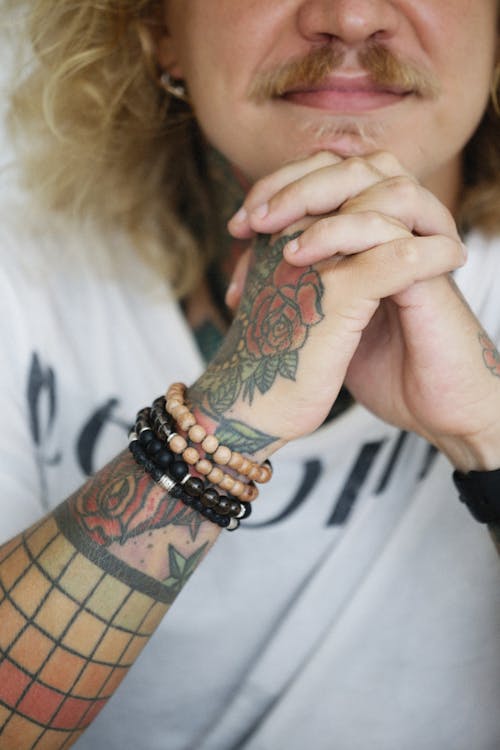 Free Person with an Arm Tattoo Stock Photo