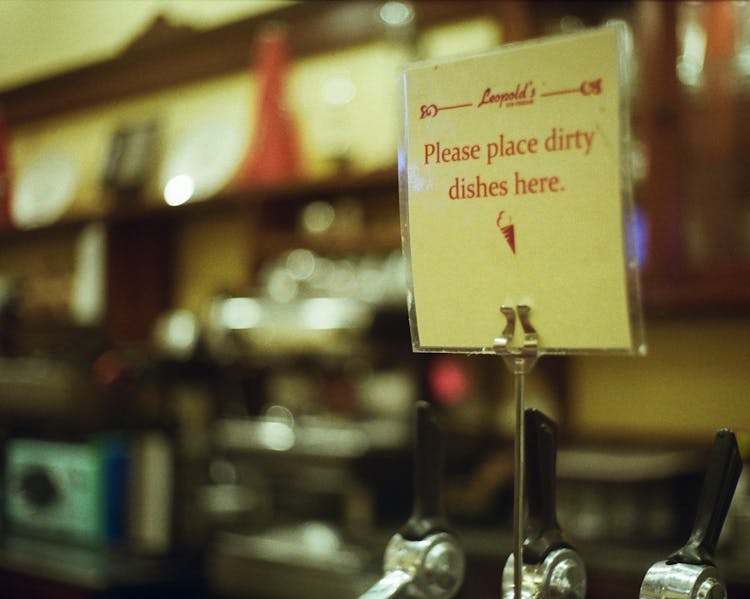 Laminated Note On A Restaurant Counter