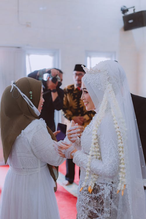 Woman in White Wedding Dress Smiling