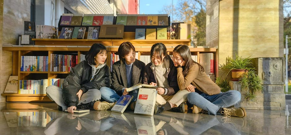 A group of women discussing travel plans around a table in a cozy bookstore.. Lens: 李奇