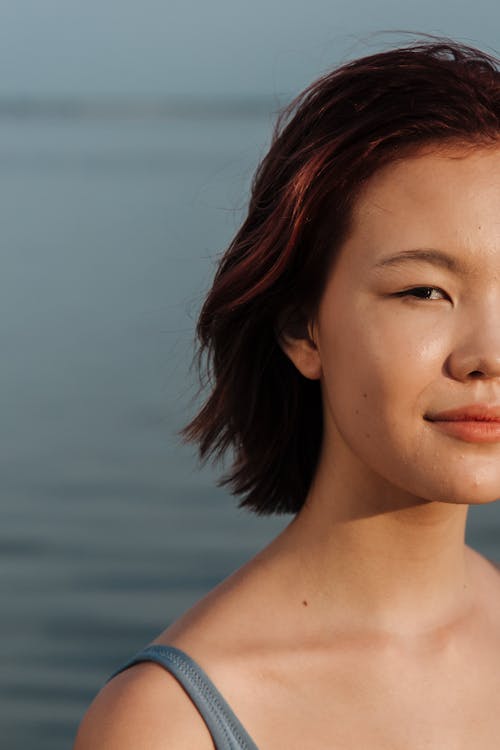 Half of Face of Girl with Short Hair Smiling