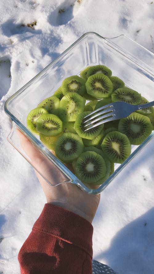 Overhead Shot Kiwi Slices in a Glass Container