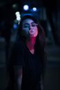 Woman in Black Shirt Wearing Eyeglasses Popping Bubble Gum
