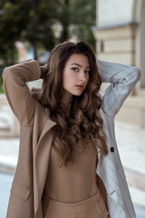 A Young Woman Posing in a Smart Casual Outfit