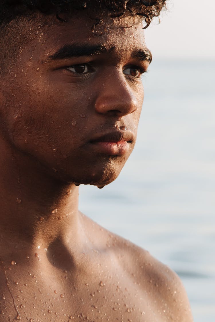 Close-up View Of Shirtless Teenage Boy