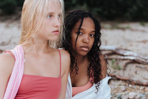 Girls Sitting on a Beach