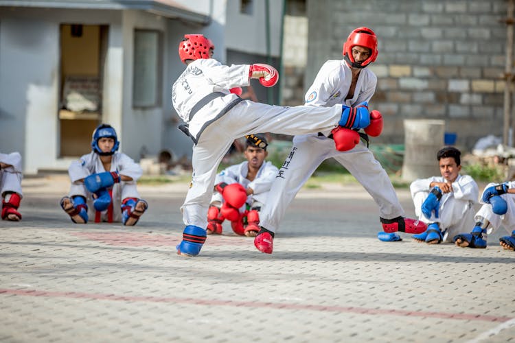 Men In A Taekwondo Match