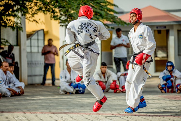 Men In A Taekwondo Match