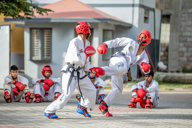 Men In A Taekwondo Match