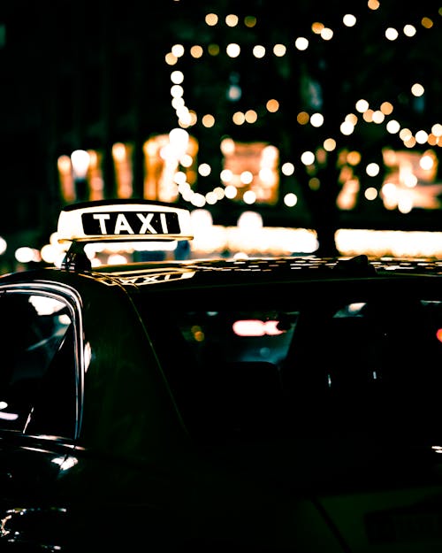 Free Black Taxi Near Lights Stock Photo