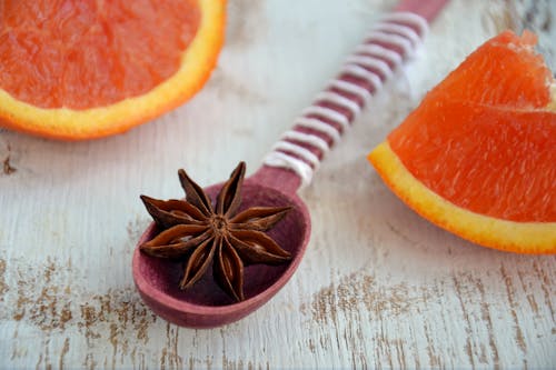 Free Star Anise on Red Spoon Stock Photo