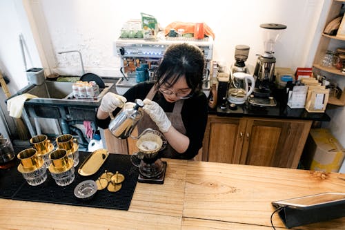 A Barista Making Drip Coffee