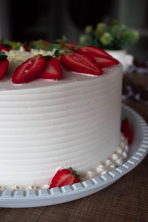Close-Up Shot of a Cake with Strawberries