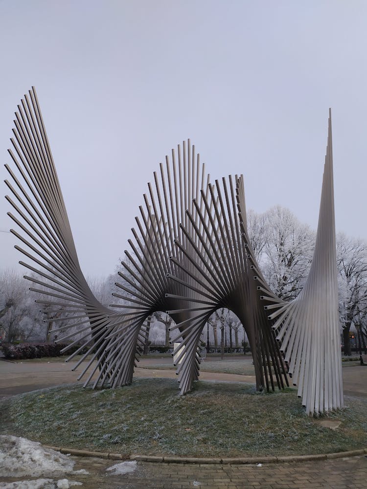 Photo Of An Abstract Metal Structure In A Park