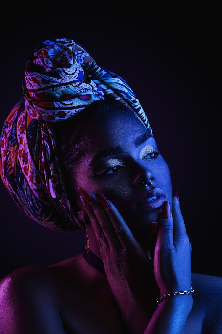 Portrait Of Woman In Turban In Pink And Blue Lighting
