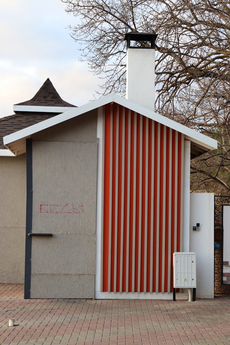 Public Toilet In Autumn